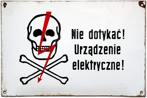 Porcelain Sign, White w/ Black Lettering; "Do not touch! Electric device!"