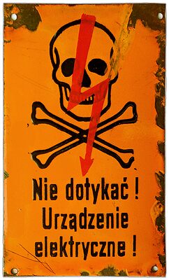 Porcelain Enamel Sign {Poland}, Black lettering and a Red lightning bolt on an Orange background; Portrait orientation and uncommon Orange background!